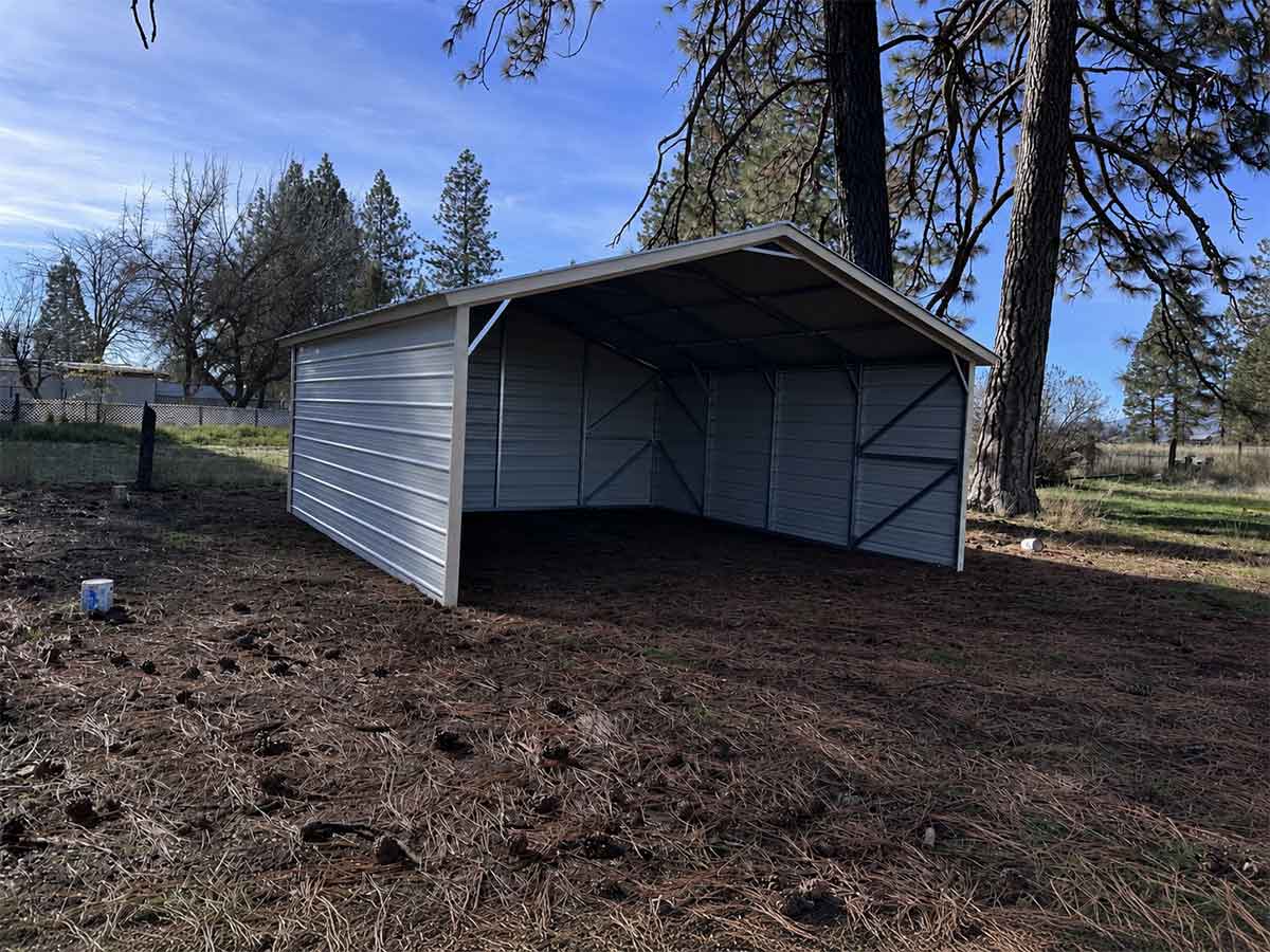 Completed metal carport covering the same property area